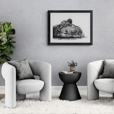  Charcoal artwork of a female gorilla and her baby displayed in a living room – wildlife artist Laurence Saunois