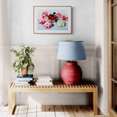  Framed painting of flowers and a bumblebee wall art decor in a setting above a coffee table by wildlife artist Laurence Saunois