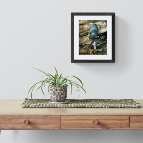 Oil painting of a young wolf above a shelf by wildlife artist Laurence Saunois